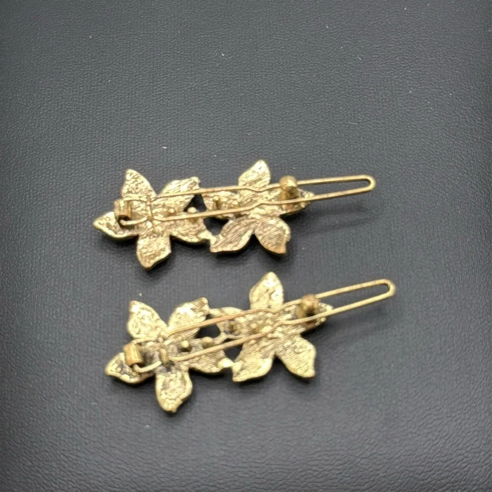 Beautiful red rhinestone statement brooch and complimentary hair barrettes